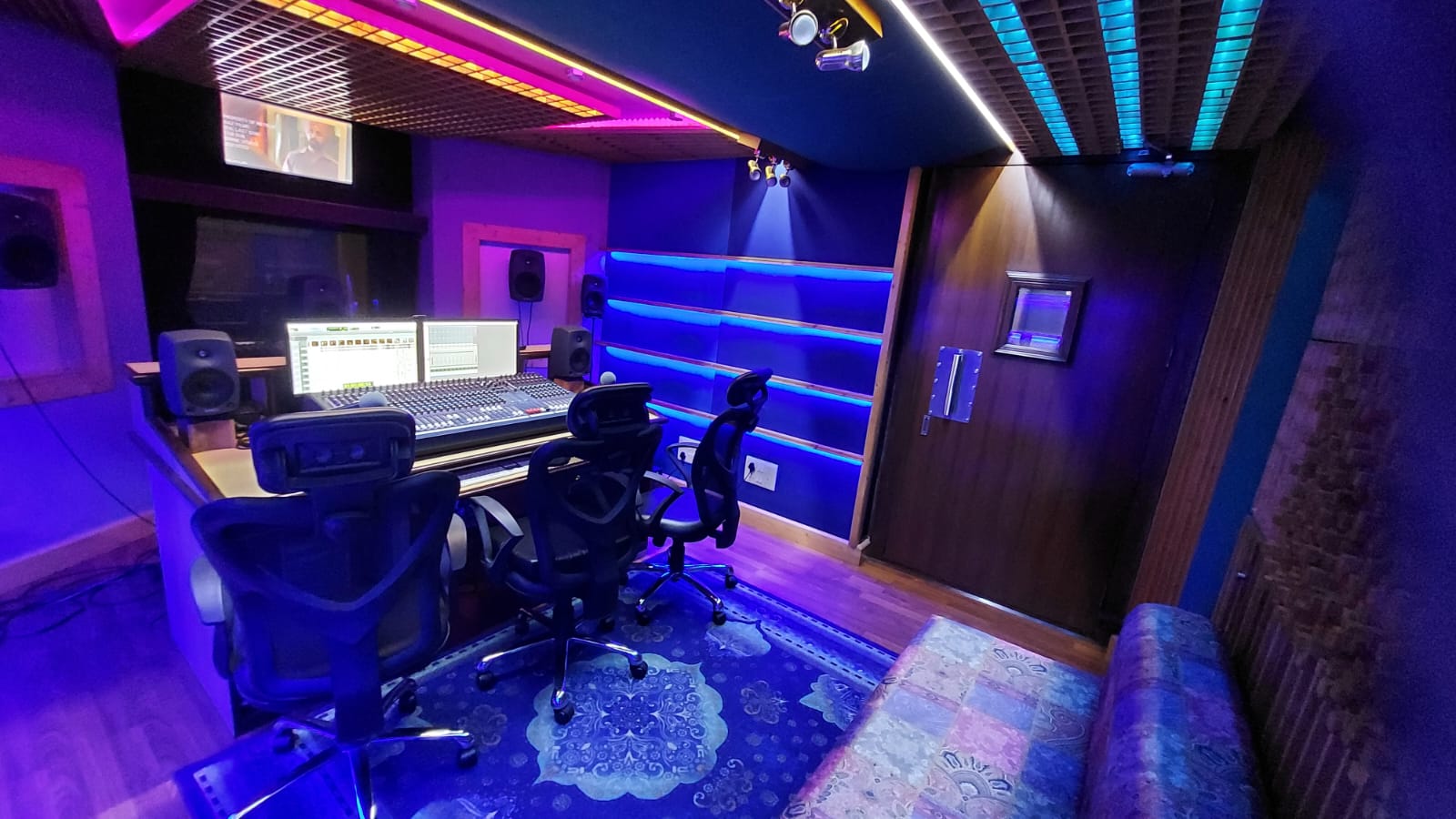 Wide side view of the Divine Digital Studio control room